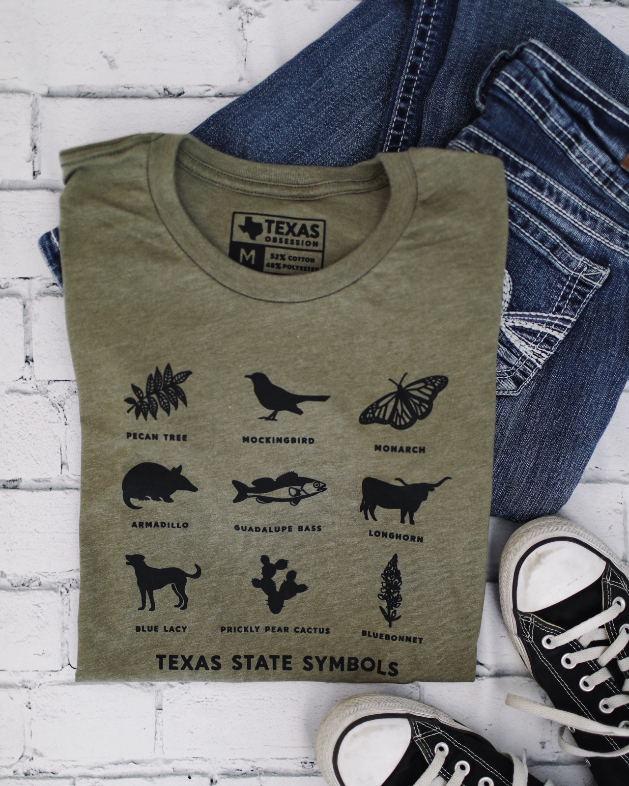 Texas State Symbols tee styled with denim and sneakers